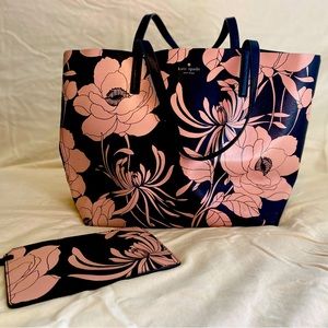 Black and pick Kate Spade tote with matching coin purse.
